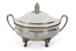 A George III oval soup tureen and cover engraved with a contempory Coat of Arms, the domed cover