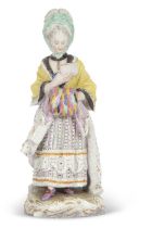 A 19th Century Meissen figure of the Race Goers Companion, cross swords mark and impressed
