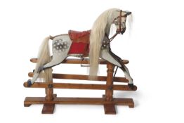 G & J Lines- A fine early 20th Century dappled grey rocking horse with metal rocker and later