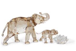 A Swarovski SCS annual edition figure of Cinta elephant together with a baby elephant, 2013, with