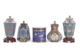 A group of decorative Cloisonne wares, early 20th Century including a pair of vases and covers,
