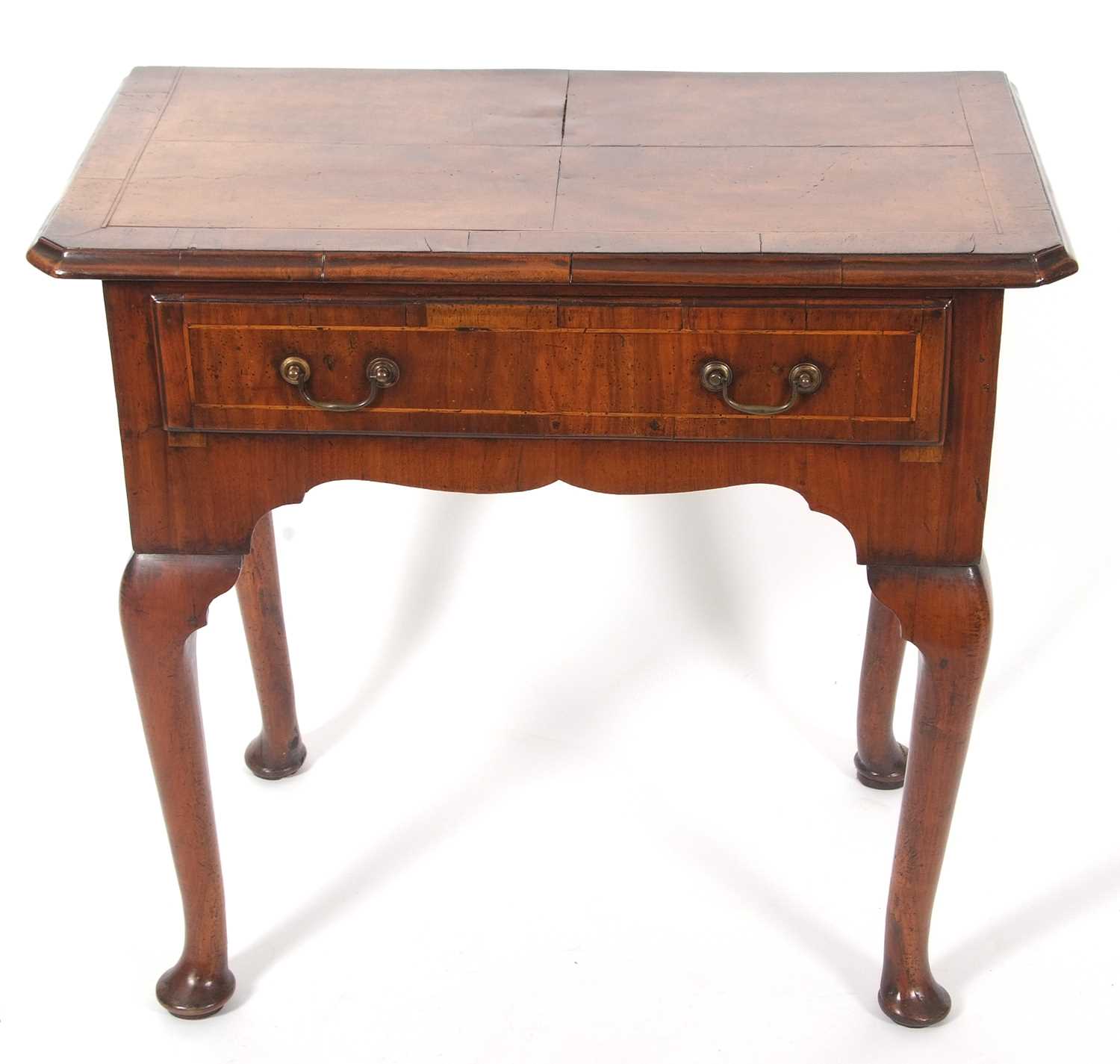 An early 18th Century walnut low boy, the top with quartered veneers and canted front corners over a - Image 4 of 10