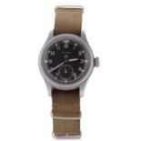 A Timor Dirty Dozen wristwatch, the watch has a manually crown wound movement, the case back is