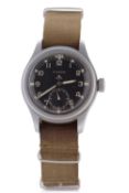 A Timor Dirty Dozen wristwatch, the watch has a manually crown wound movement, the case back is