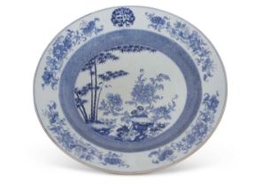 A superb Chinese porcelain Qianlong charger decorated to the centre with bamboo and floral sprays