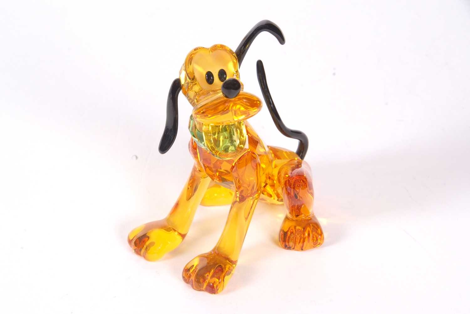 A Swarovski Disney figure of Pluto with yellow colour, black ears and tail, with original box, 9cm - Image 5 of 16