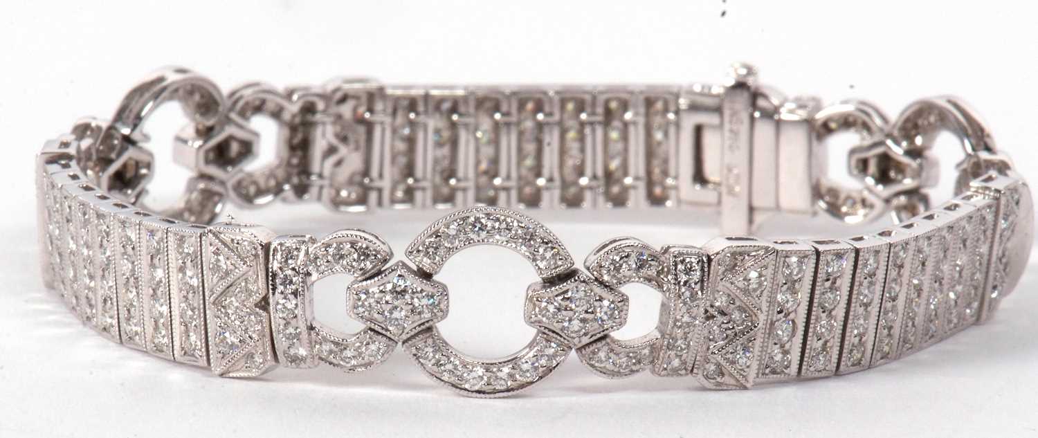 An 18ct white gold and diamond Art Deco style bracelet, comprised of three circlets of small round - Image 12 of 14