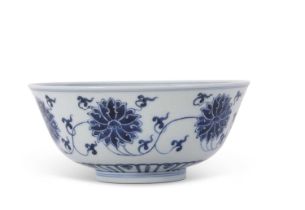 A 19th Century Chinese porcelain bowl decorated in Imperial fashion with scrolling lotus, six