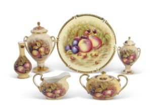 A quantity of Aynsley wares decorated with fruit including a sucrier and cover, signed by D Jones