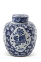 A large Chinese porcelain ginger jar and cover, 19th Century, decorated with prunus and panels of