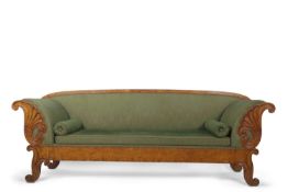 A large Scandinavian Biedermeier style birch sofa with green upholstery and bolster cushions, the