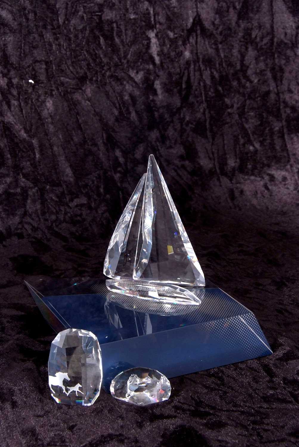 A Swarovski model of a yacht on fitted stand together with two small Swarovski paperweights, one - Image 4 of 4