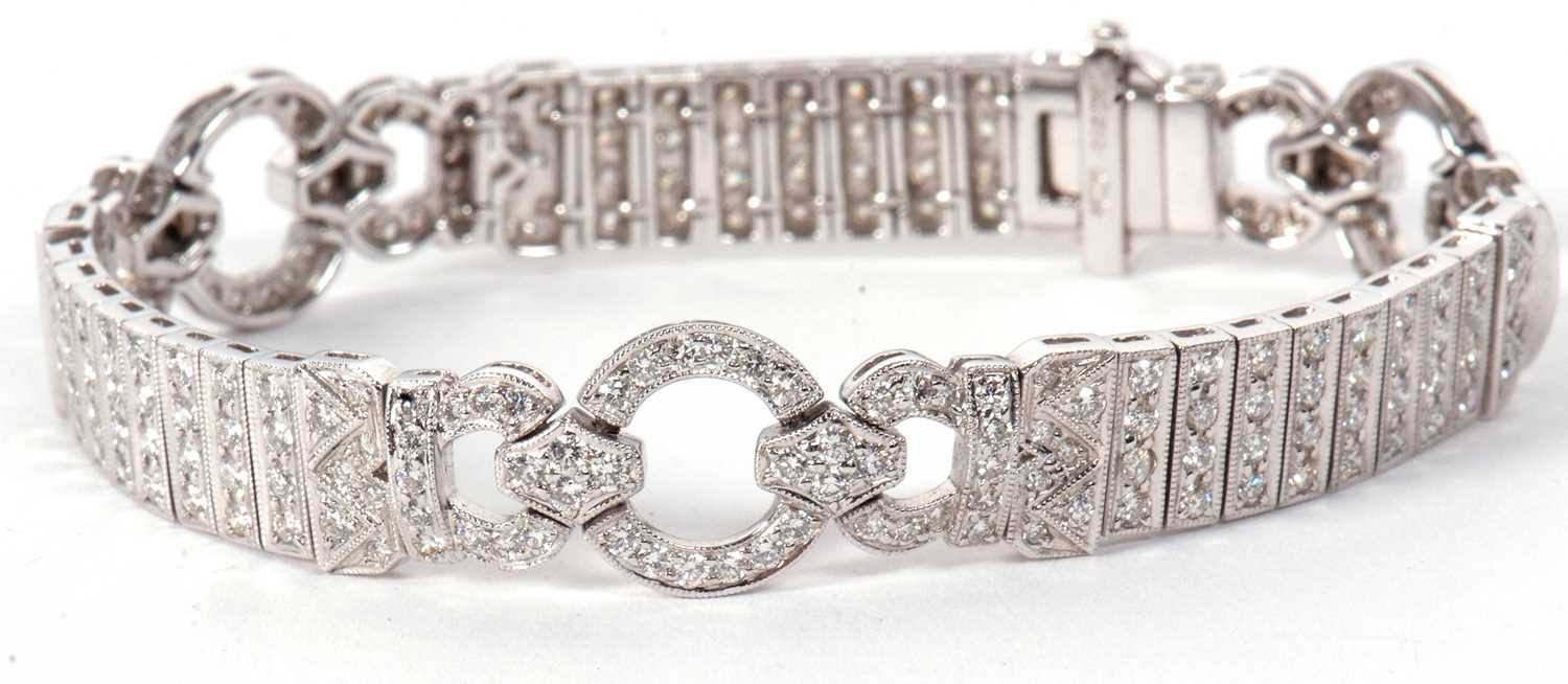 An 18ct white gold and diamond Art Deco style bracelet, comprised of three circlets of small round - Image 11 of 14