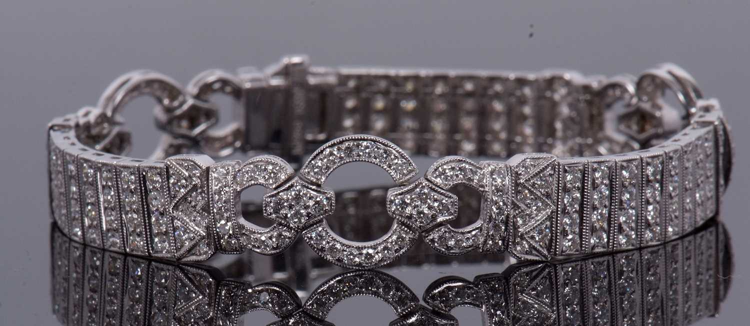 An 18ct white gold and diamond Art Deco style bracelet, comprised of three circlets of small round - Image 4 of 14