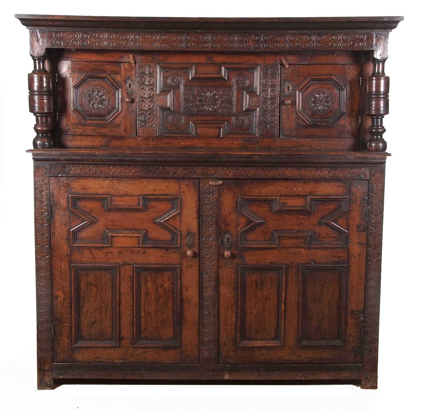 A large 17th Century oak court cupboard with moulded cornice over a top section with two panelled - Image 2 of 12