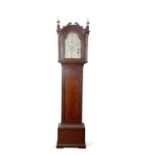 William Morris, Yarmouth a Georgian mahogany long case clock with silvered arch dial with Roman