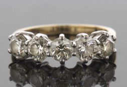 An 18ct five stone diamond ring, the five round brilliant cut diamonds, total estimated approx. 2.