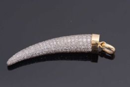 A bi-colour diamond set horn pendant, the tapered horn with allover pave set diamonds, one half with