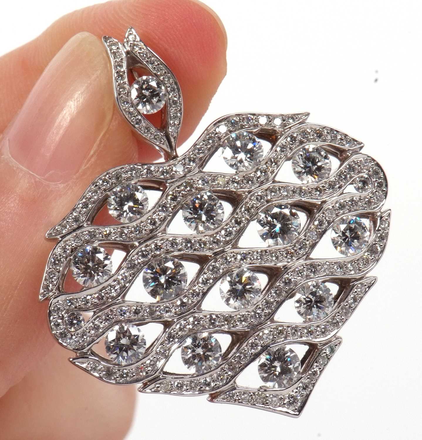 An 18ct white gold diamond heart pendant by Cyril Waskoll, the heart covered with a diamond set - Image 7 of 8