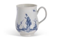 An early Worcester bell shaped mug c.1756 decorated in pale tones of underglaze blue with the "