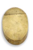 A rare 18th Century brass tobacco box of large oval shape, inscribed to the hatch with a figure