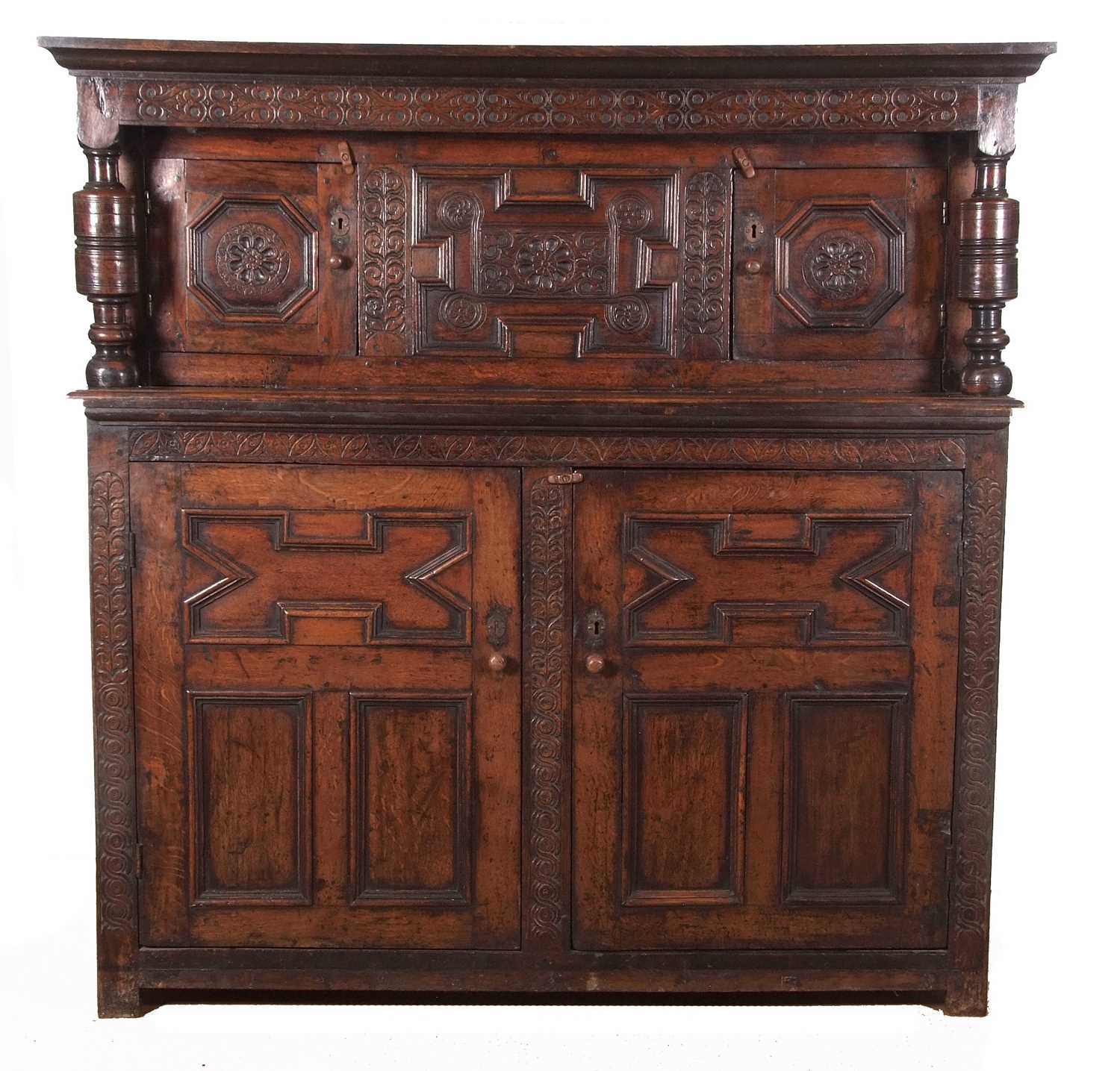 A large 17th Century oak court cupboard with moulded cornice over a top section with two panelled - Image 8 of 12