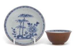 A Chinese porcelain Nanking Cargo tea bowl and saucer with Christies label to base
