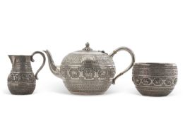 A cased Victorian three piece silver breakfast service, comprising teapot, milk jug and sugar
