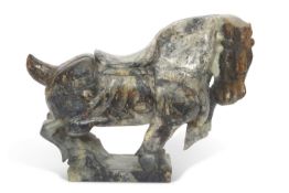 A large Chinese hardstone model of a horse set on a plinth base, 73cm long, 53cm high, 20cm wide