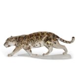 A Swarovski model of a leopard on shaped frosted base, the model with brown markings with original