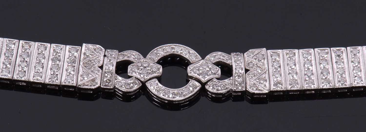 An 18ct white gold and diamond Art Deco style bracelet, comprised of three circlets of small round - Image 6 of 14