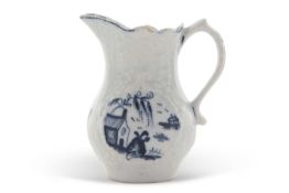 A rare early Lowestoft porcelain cream jug, circa 1762, the body with Hughes type moulding of