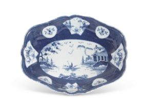 An 18th Century Bow porcelain shaped dish circa 1765, the powder blue ground with panels of