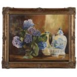 British School, 20th century, Still life with lilac flowers and blueware, oil on board,