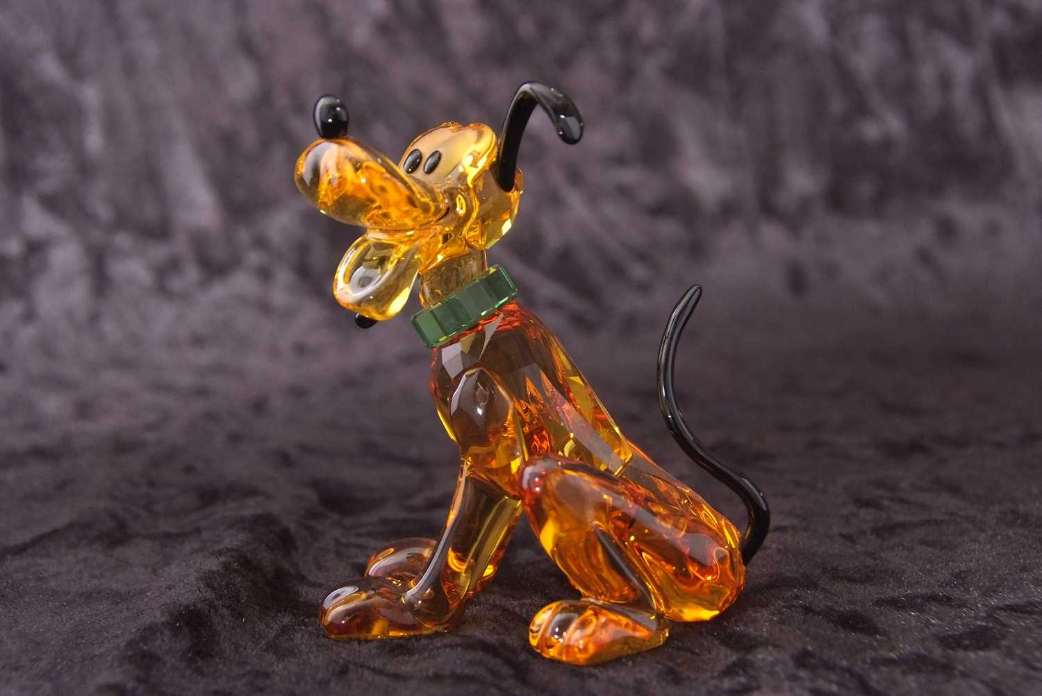 A Swarovski Disney figure of Pluto with yellow colour, black ears and tail, with original box, 9cm - Image 2 of 16