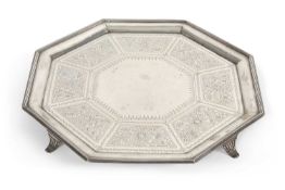 A Victorian salver of octagonal form with a reeded rim, a plain ground centre with engraved