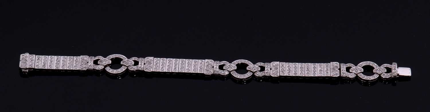 An 18ct white gold and diamond Art Deco style bracelet, comprised of three circlets of small round - Image 5 of 14