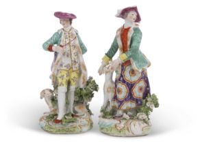 A good quality pair of 19th century Samson "Derby" style porcelain figures modelled as a lady and