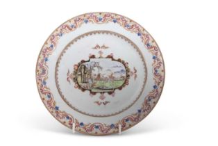 A early 18th Century Chinese porcelain plate, the centre decorated with a hunting scene within
