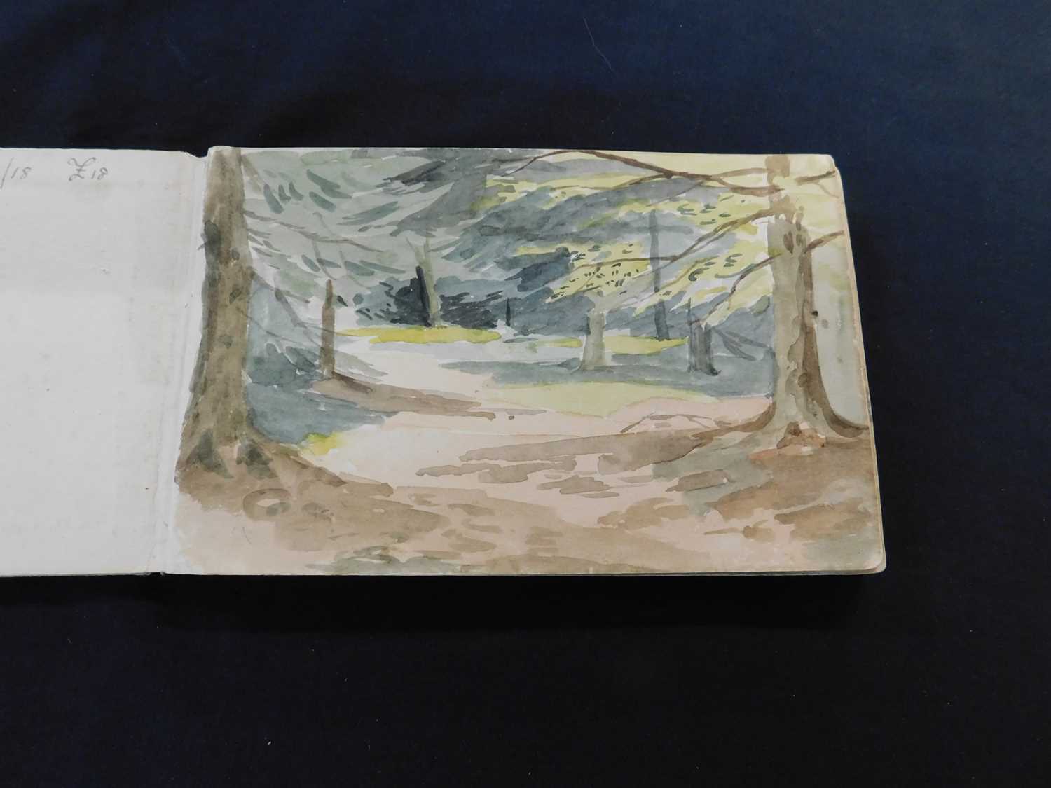 Cloth bound pocket sketch book containing 16 assorted watercolours, captioned verso, some dated