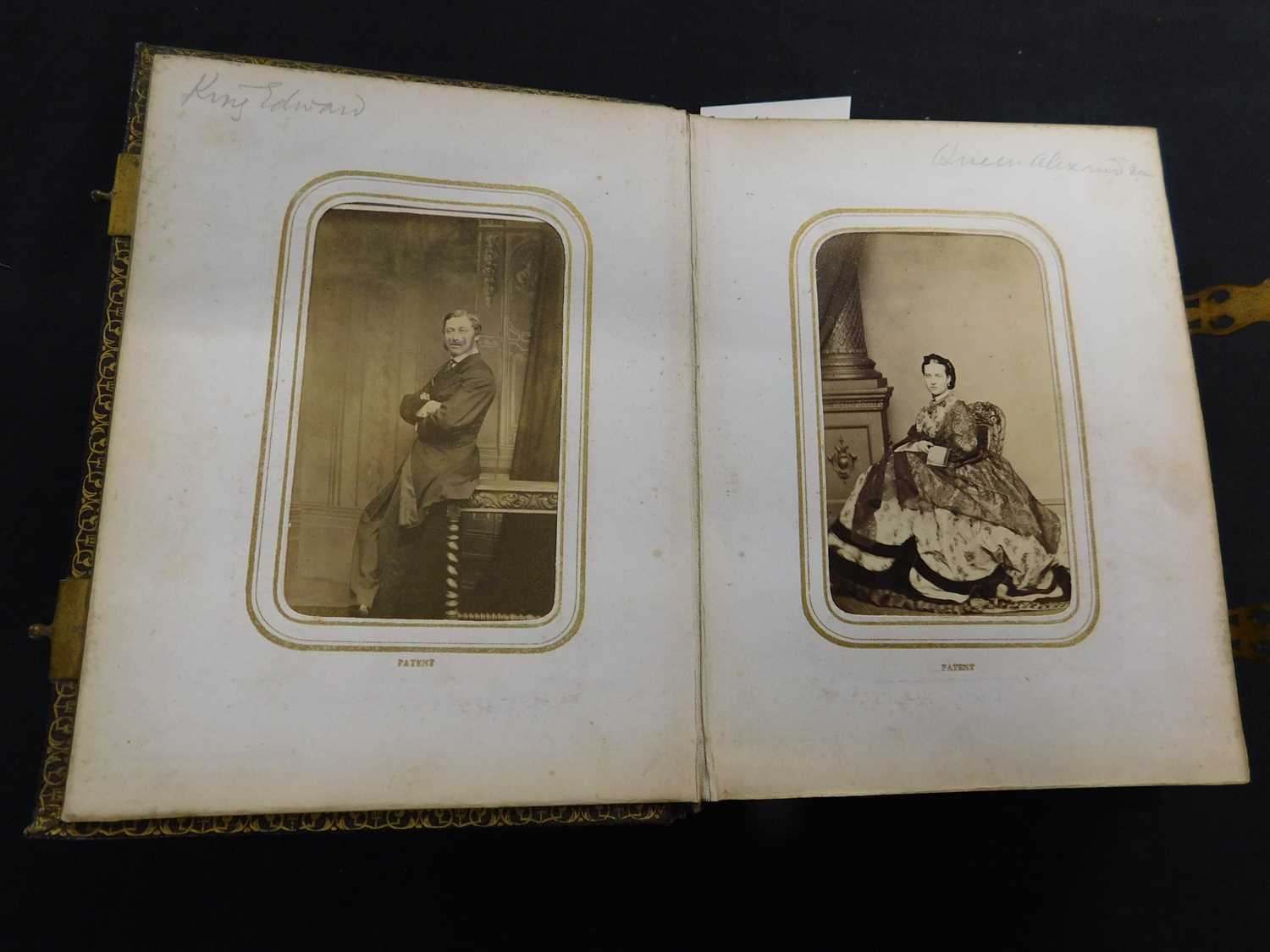 Small Victorian Carte de Visite album containing 48 photos including Queen Victoria and Albert, King