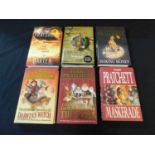 Terry PRATCHETT, six various DIscworld novels, see photograph.