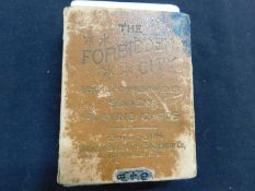A vintage set of playing cards dating from the Boxer Rebellion entitled "The Forbidden City Pekin