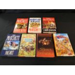 Terry PRATCHETT, seven various DIscworld novels, see photograph.