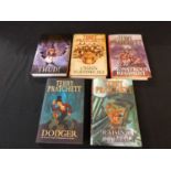 Terry PRATCHETT, five various DIscworld novels, see photograph.