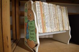 Beatrix Potter, 23 assorted within wooden "My Peter Rabbit Bookshelf", most with d/w