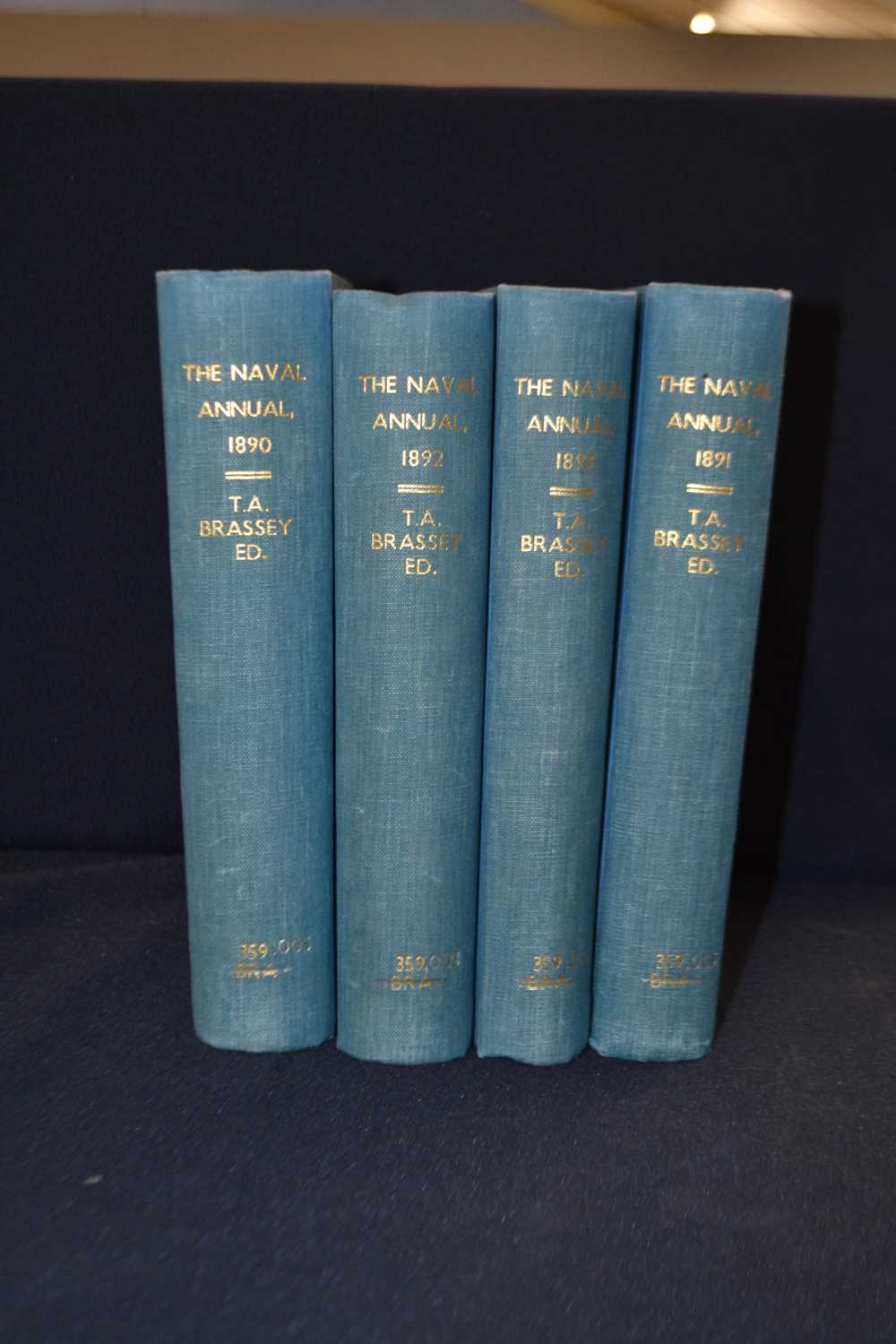 T A BRASSEY: THE NAVAL ANNUAL: 4 volumes, 1890. Ex library in ex library binding. Ffeps removed as