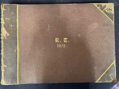 Album containing various topographical and ecclesiastical photographs. Gilt lettering to cover: R. T
