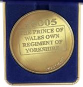 A commemorative gold award medallion to 55055 The Prince of Wales Own