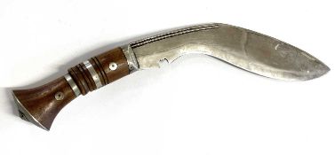 20th Century Nepalese kukri knife with double fuller, turned wooden handle with metal pommel, overal